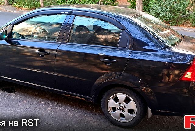Черный Шевроле Авео, объемом двигателя 1.5 л и пробегом 166 тыс. км за 3800 $, фото 1 на Automoto.ua