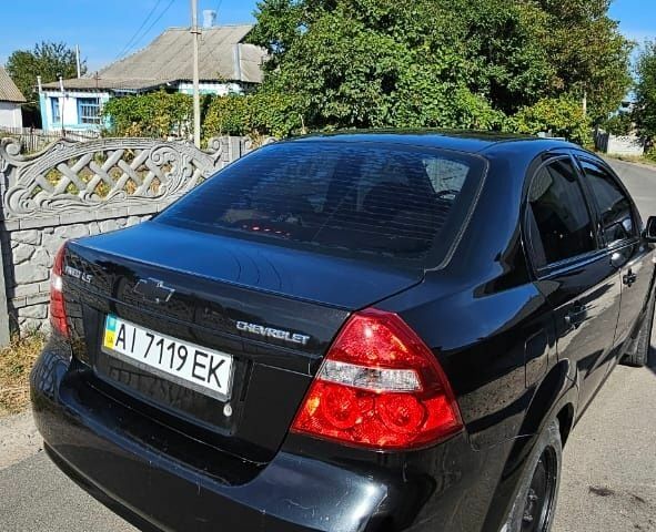 Черный Шевроле Авео, объемом двигателя 1.5 л и пробегом 118 тыс. км за 3500 $, фото 2 на Automoto.ua