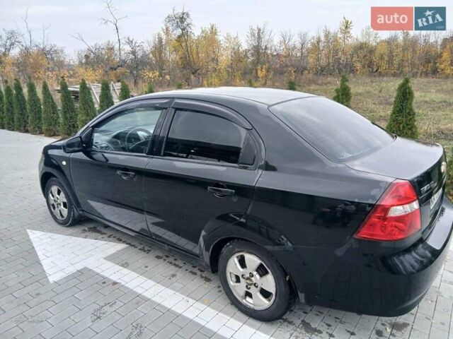Черный Шевроле Авео, объемом двигателя 1.5 л и пробегом 206 тыс. км за 3900 $, фото 5 на Automoto.ua