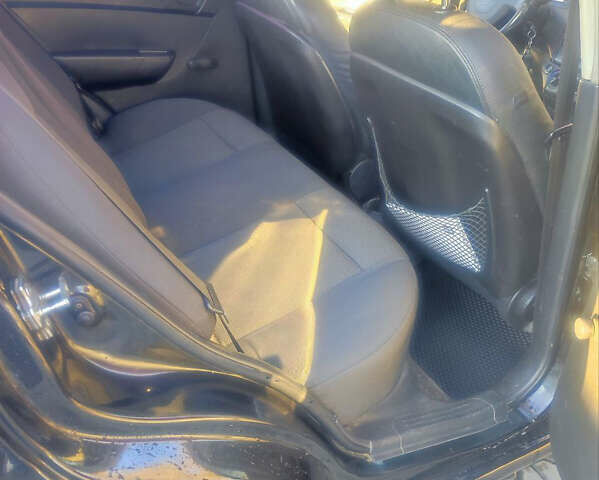 Черный Шевроле Авео, объемом двигателя 1.5 л и пробегом 449 тыс. км за 2800 $, фото 8 на Automoto.ua