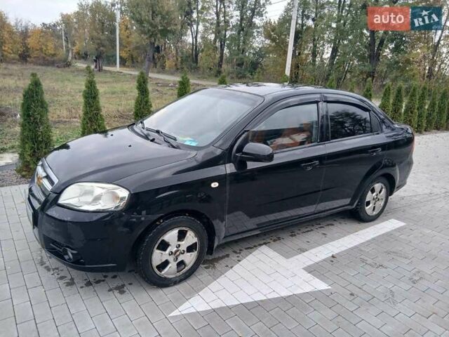 Черный Шевроле Авео, объемом двигателя 1.5 л и пробегом 206 тыс. км за 3900 $, фото 1 на Automoto.ua