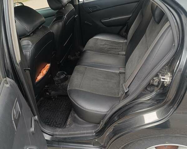 Чорний Шевроле Авео, об'ємом двигуна 1.5 л та пробігом 307 тис. км за 3450 $, фото 4 на Automoto.ua
