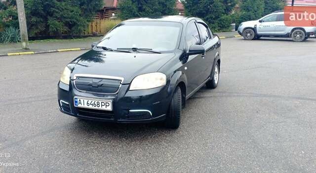 Черный Шевроле Авео, объемом двигателя 1.5 л и пробегом 205 тыс. км за 4200 $, фото 1 на Automoto.ua