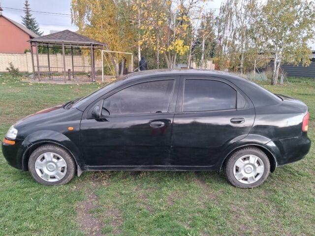 Черный Шевроле Авео, объемом двигателя 1.5 л и пробегом 300 тыс. км за 2100 $, фото 1 на Automoto.ua