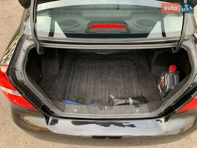 Черный Шевроле Авео, объемом двигателя 1.5 л и пробегом 205 тыс. км за 3650 $, фото 3 на Automoto.ua