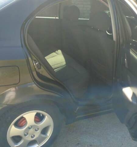 Чорний Шевроле Авео, об'ємом двигуна 1.5 л та пробігом 234 тис. км за 4300 $, фото 4 на Automoto.ua