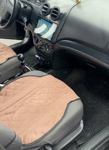 Черный Шевроле Авео, объемом двигателя 1.5 л и пробегом 205 тыс. км за 4200 $, фото 5 на Automoto.ua