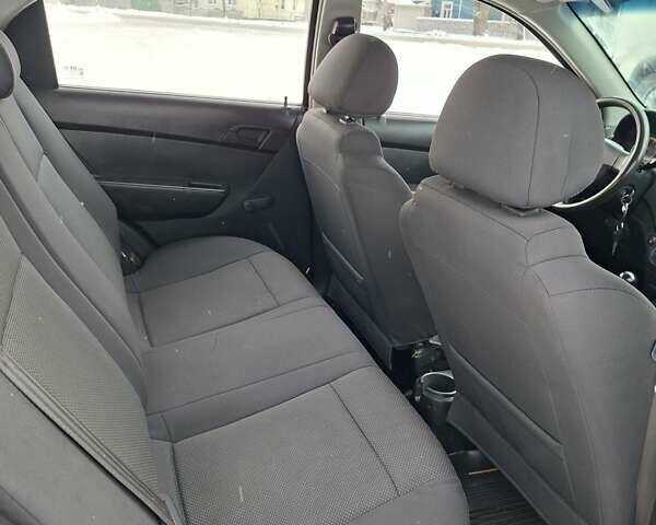 Черный Шевроле Авео, объемом двигателя 1.5 л и пробегом 213 тыс. км за 3900 $, фото 22 на Automoto.ua