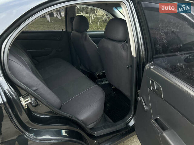Черный Шевроле Авео, объемом двигателя 1.5 л и пробегом 250 тыс. км за 3350 $, фото 13 на Automoto.ua