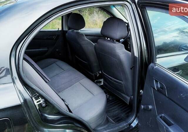Черный Шевроле Авео, объемом двигателя 1.5 л и пробегом 120 тыс. км за 4870 $, фото 26 на Automoto.ua