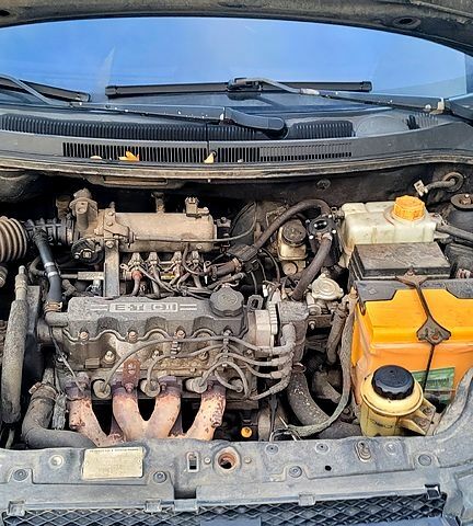 Черный Шевроле Авео, объемом двигателя 1.5 л и пробегом 290 тыс. км за 3300 $, фото 1 на Automoto.ua