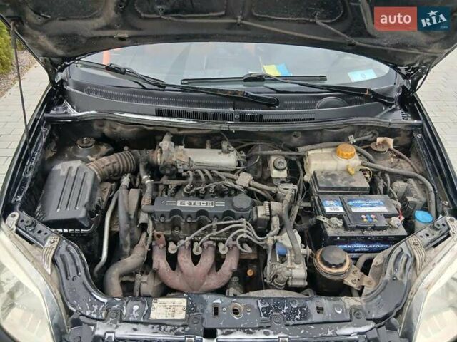 Черный Шевроле Авео, объемом двигателя 1.5 л и пробегом 206 тыс. км за 3900 $, фото 12 на Automoto.ua