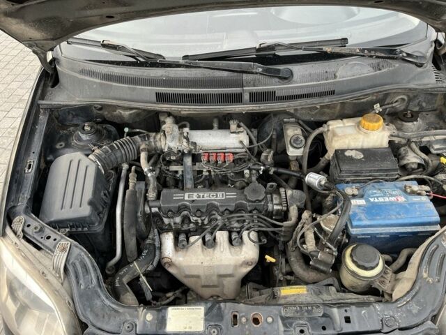 Чорний Шевроле Авео, об'ємом двигуна 1.5 л та пробігом 325 тис. км за 2999 $, фото 12 на Automoto.ua