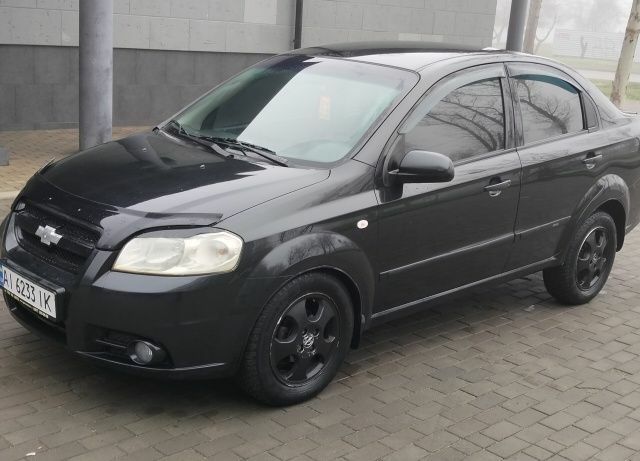 Черный Шевроле Авео, объемом двигателя 1.5 л и пробегом 240 тыс. км за 3600 $, фото 2 на Automoto.ua