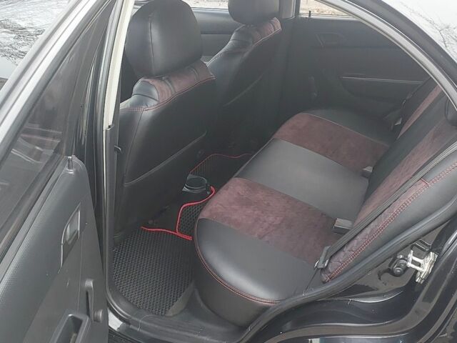 Черный Шевроле Авео, объемом двигателя 1.5 л и пробегом 196 тыс. км за 3800 $, фото 4 на Automoto.ua