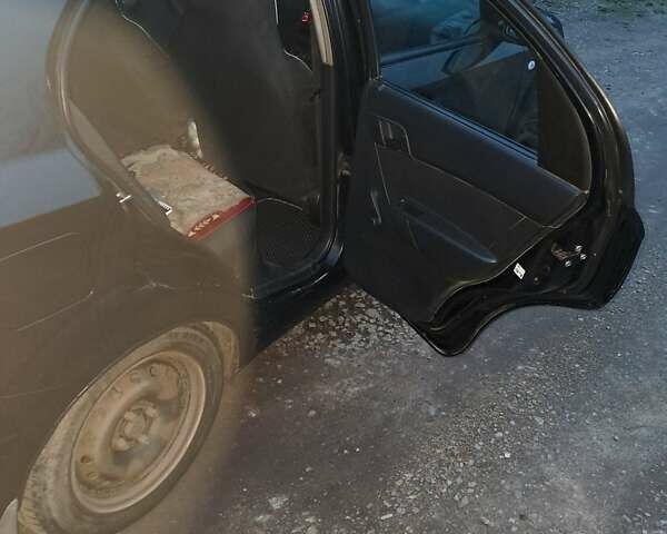 Черный Шевроле Авео, объемом двигателя 1.5 л и пробегом 272 тыс. км за 3700 $, фото 7 на Automoto.ua