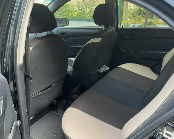 Черный Шевроле Авео, объемом двигателя 1.5 л и пробегом 280 тыс. км за 3500 $, фото 4 на Automoto.ua