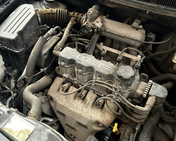 Черный Шевроле Авео, объемом двигателя 1.5 л и пробегом 145 тыс. км за 4200 $, фото 22 на Automoto.ua