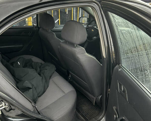 Черный Шевроле Авео, объемом двигателя 1.5 л и пробегом 145 тыс. км за 4200 $, фото 19 на Automoto.ua