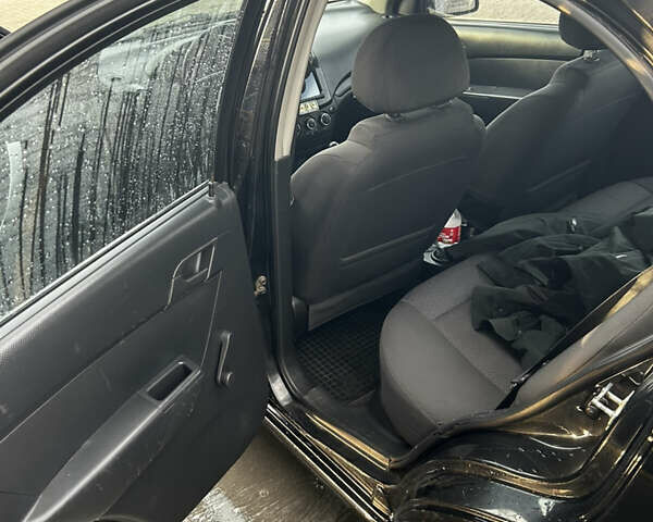 Черный Шевроле Авео, объемом двигателя 1.5 л и пробегом 145 тыс. км за 4200 $, фото 16 на Automoto.ua