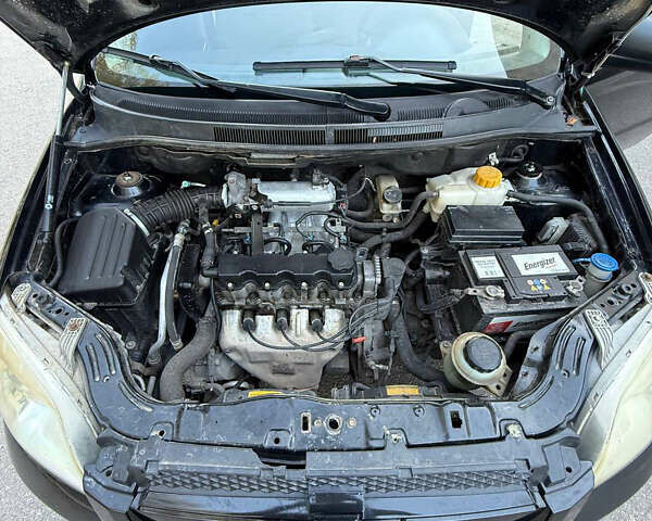 Черный Шевроле Авео, объемом двигателя 1.5 л и пробегом 300 тыс. км за 3700 $, фото 11 на Automoto.ua