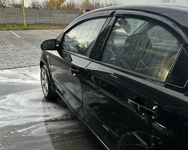 Черный Шевроле Авео, объемом двигателя 1.5 л и пробегом 145 тыс. км за 4200 $, фото 1 на Automoto.ua