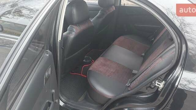 Черный Шевроле Авео, объемом двигателя 1.5 л и пробегом 196 тыс. км за 3800 $, фото 1 на Automoto.ua