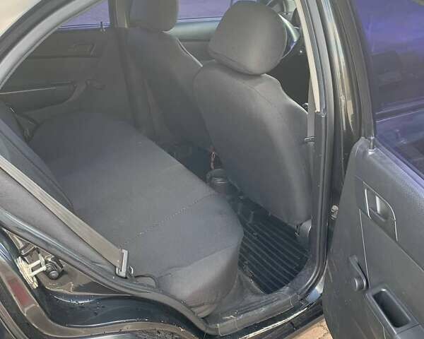 Шевроле Авео 2008 в Житомире на Automoto.ua Черный Шевроле Авео, объемом двигателя 1.5 л и пробегом 546 тыс. км за 3200 $, фото 8 на Automoto.ua