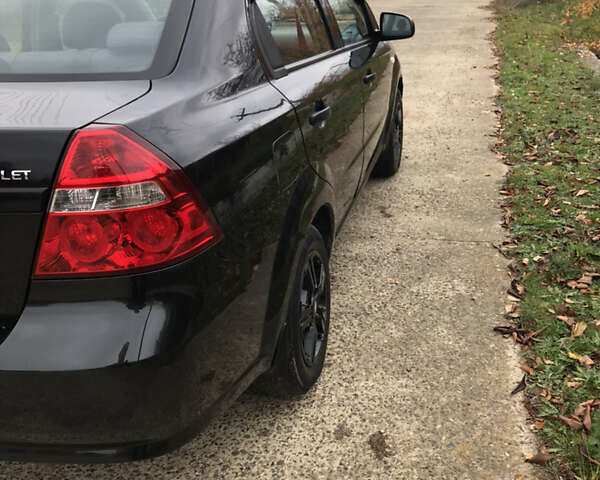 Черный Шевроле Авео, объемом двигателя 1.5 л и пробегом 191 тыс. км за 3900 $, фото 11 на Automoto.ua