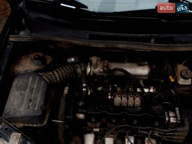 Черный Шевроле Авео, объемом двигателя 1.5 л и пробегом 335 тыс. км за 3400 $, фото 2 на Automoto.ua