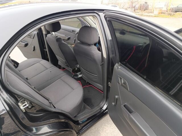 Черный Шевроле Авео, объемом двигателя 1.5 л и пробегом 216 тыс. км за 4000 $, фото 8 на Automoto.ua