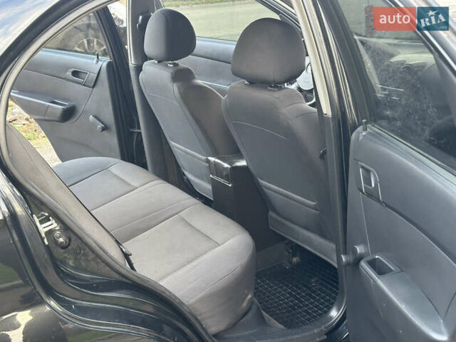 Чорний Шевроле Авео, об'ємом двигуна 1.5 л та пробігом 269 тис. км за 3750 $, фото 13 на Automoto.ua