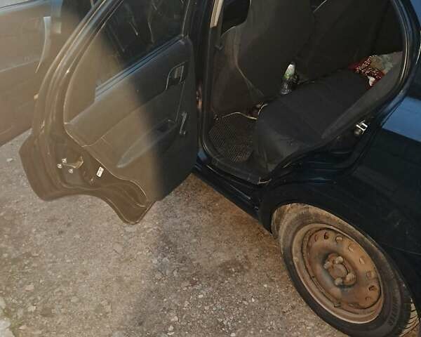 Черный Шевроле Авео, объемом двигателя 1.5 л и пробегом 272 тыс. км за 3700 $, фото 5 на Automoto.ua
