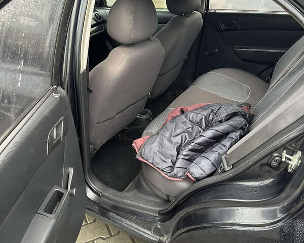 Черный Шевроле Авео, объемом двигателя 1.5 л и пробегом 300 тыс. км за 3400 $, фото 6 на Automoto.ua