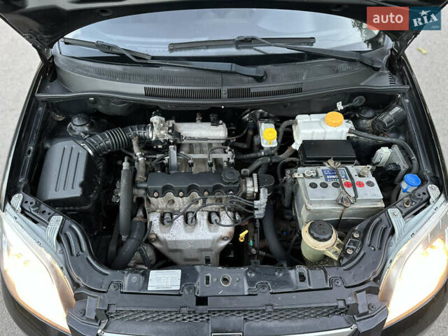 Черный Шевроле Авео, объемом двигателя 1.5 л и пробегом 140 тыс. км за 3999 $, фото 23 на Automoto.ua