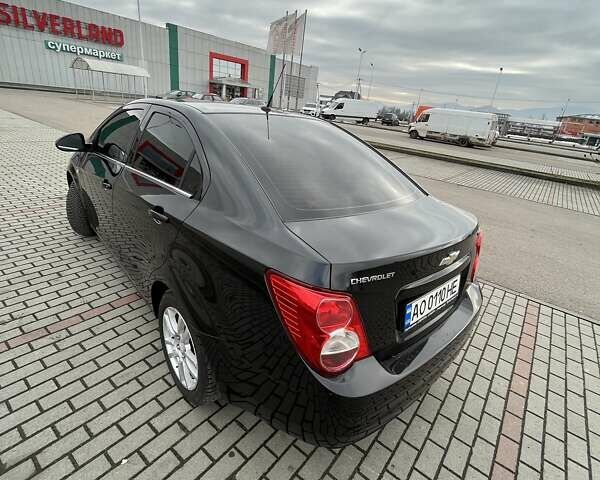 Черный Шевроле Авео, объемом двигателя 1.6 л и пробегом 170 тыс. км за 6100 $, фото 11 на Automoto.ua