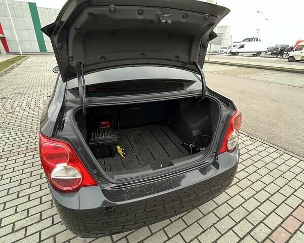Черный Шевроле Авео, объемом двигателя 1.6 л и пробегом 170 тыс. км за 6100 $, фото 16 на Automoto.ua