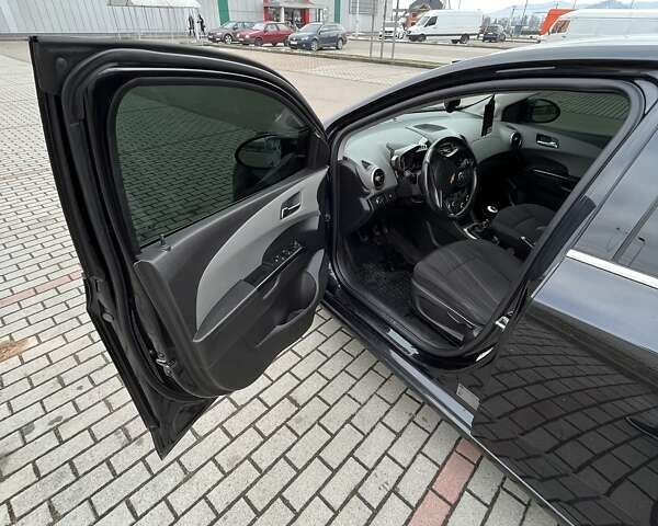Черный Шевроле Авео, объемом двигателя 1.6 л и пробегом 170 тыс. км за 6100 $, фото 13 на Automoto.ua