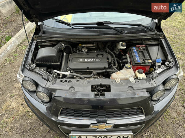 Черный Шевроле Авео, объемом двигателя 1.6 л и пробегом 143 тыс. км за 5350 $, фото 5 на Automoto.ua