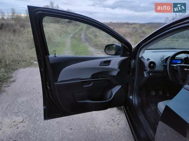 Черный Шевроле Авео, объемом двигателя 1.2 л и пробегом 328 тыс. км за 5500 $, фото 12 на Automoto.ua