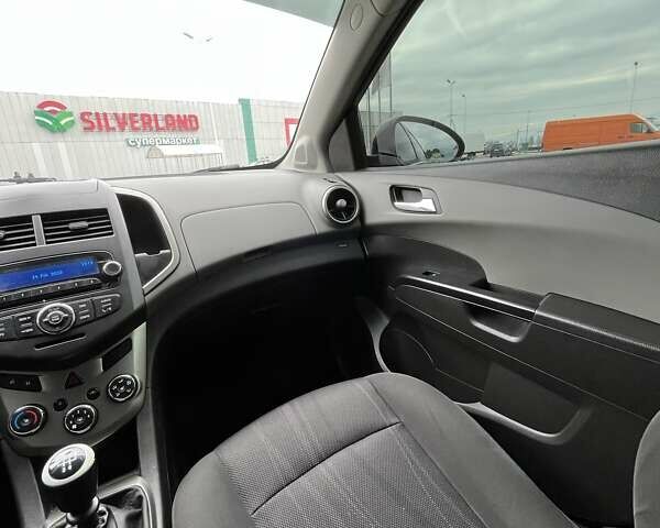 Черный Шевроле Авео, объемом двигателя 1.6 л и пробегом 170 тыс. км за 6100 $, фото 24 на Automoto.ua