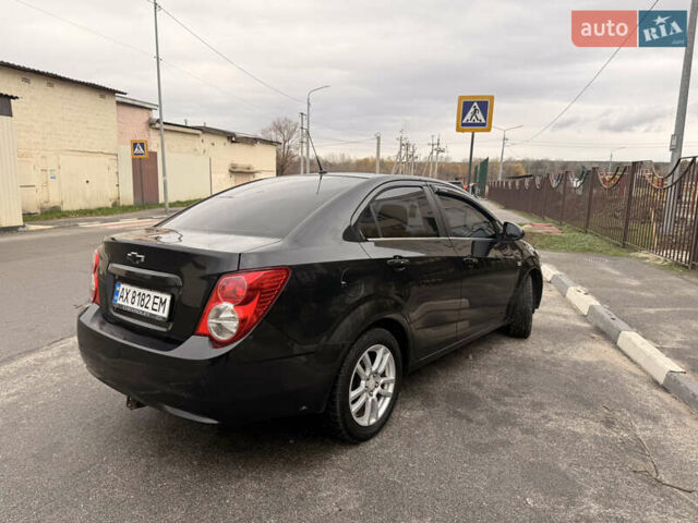 Шевроле Авео 2012 в Харькове на Automoto.ua Черный Шевроле Авео, объемом двигателя 1.6 л и пробегом 181 тыс. км за 5400 $, фото 1 на Automoto.ua