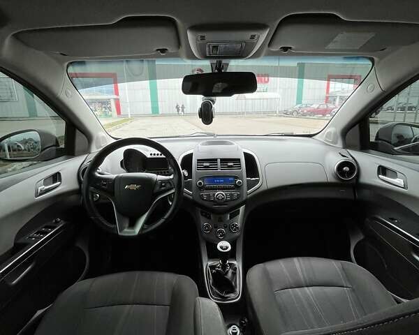 Черный Шевроле Авео, объемом двигателя 1.6 л и пробегом 170 тыс. км за 6100 $, фото 22 на Automoto.ua