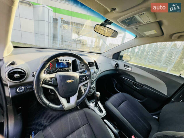Черный Шевроле Авео, объемом двигателя 1.6 л и пробегом 77 тыс. км за 7800 $, фото 1 на Automoto.ua