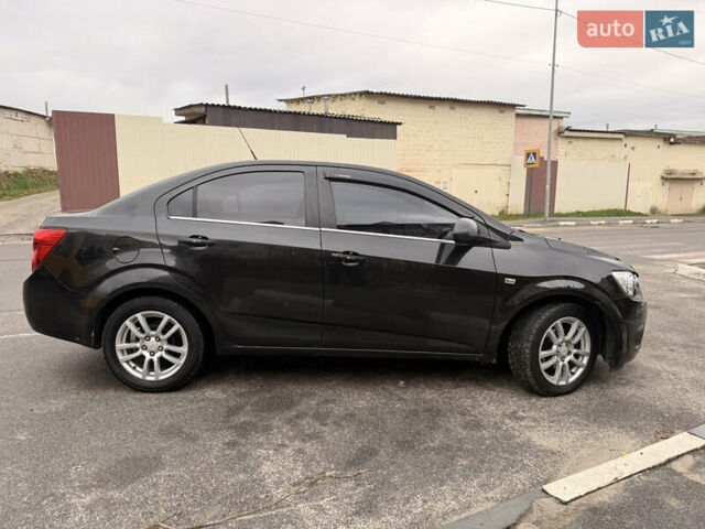 Шевроле Авео 2012 в Харькове на Automoto.ua Черный Шевроле Авео, объемом двигателя 1.6 л и пробегом 181 тыс. км за 5400 $, фото 4 на Automoto.ua