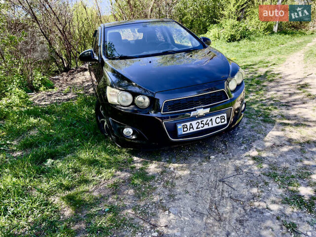 Черный Шевроле Авео, объемом двигателя 1.6 л и пробегом 95 тыс. км за 6800 $, фото 1 на Automoto.ua