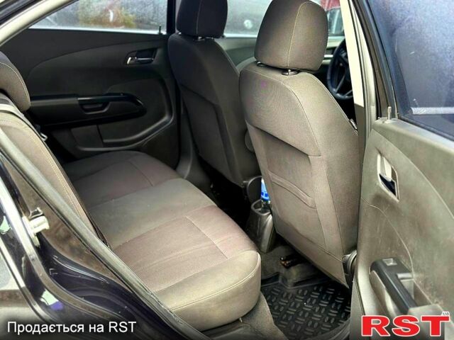 Черный Шевроле Авео, объемом двигателя 1.6 л и пробегом 191 тыс. км за 5800 $, фото 5 на Automoto.ua