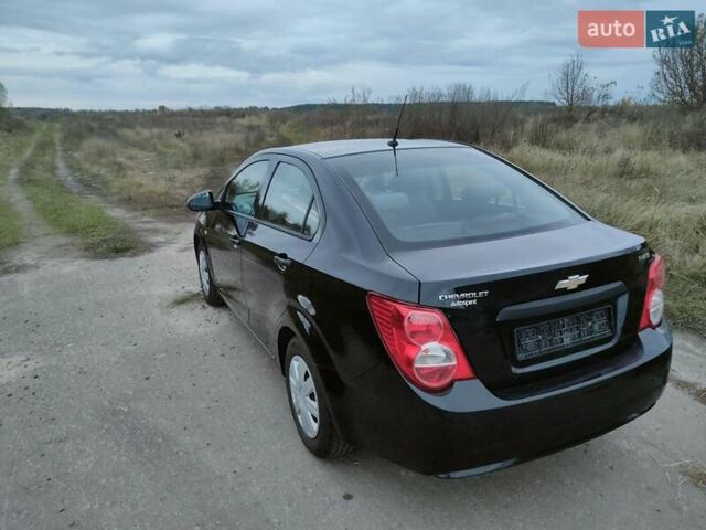 Черный Шевроле Авео, объемом двигателя 1.2 л и пробегом 328 тыс. км за 5500 $, фото 5 на Automoto.ua