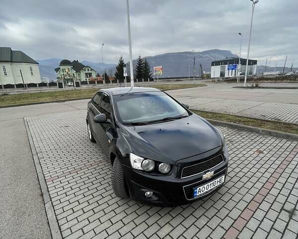 Черный Шевроле Авео, объемом двигателя 1.6 л и пробегом 170 тыс. км за 6100 $, фото 5 на Automoto.ua