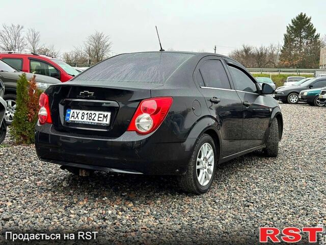 Черный Шевроле Авео, объемом двигателя 1.6 л и пробегом 191 тыс. км за 5800 $, фото 1 на Automoto.ua